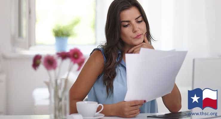 Woman with paperwork