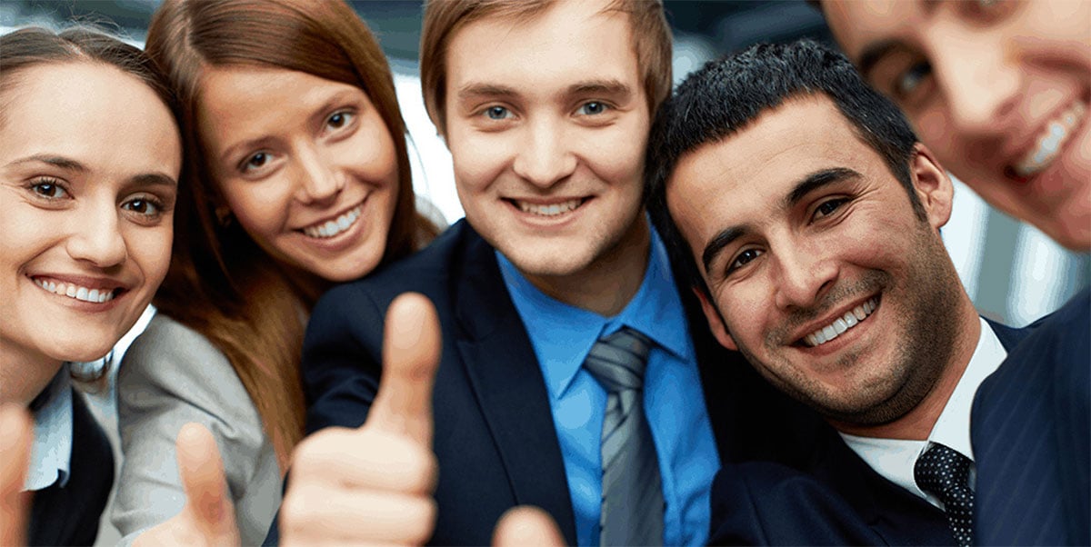 5 Career Self Assessment Resources: Image of young adults giving a thumbs-up.